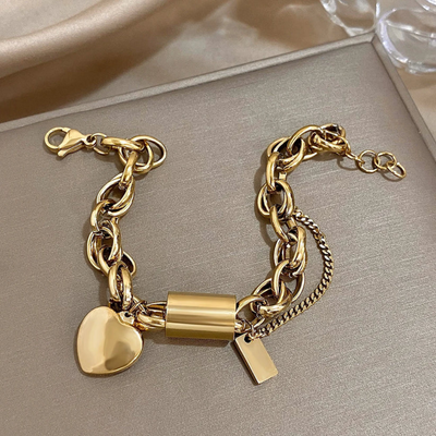 Alva - Grovt armband med hjärta i 18k guld